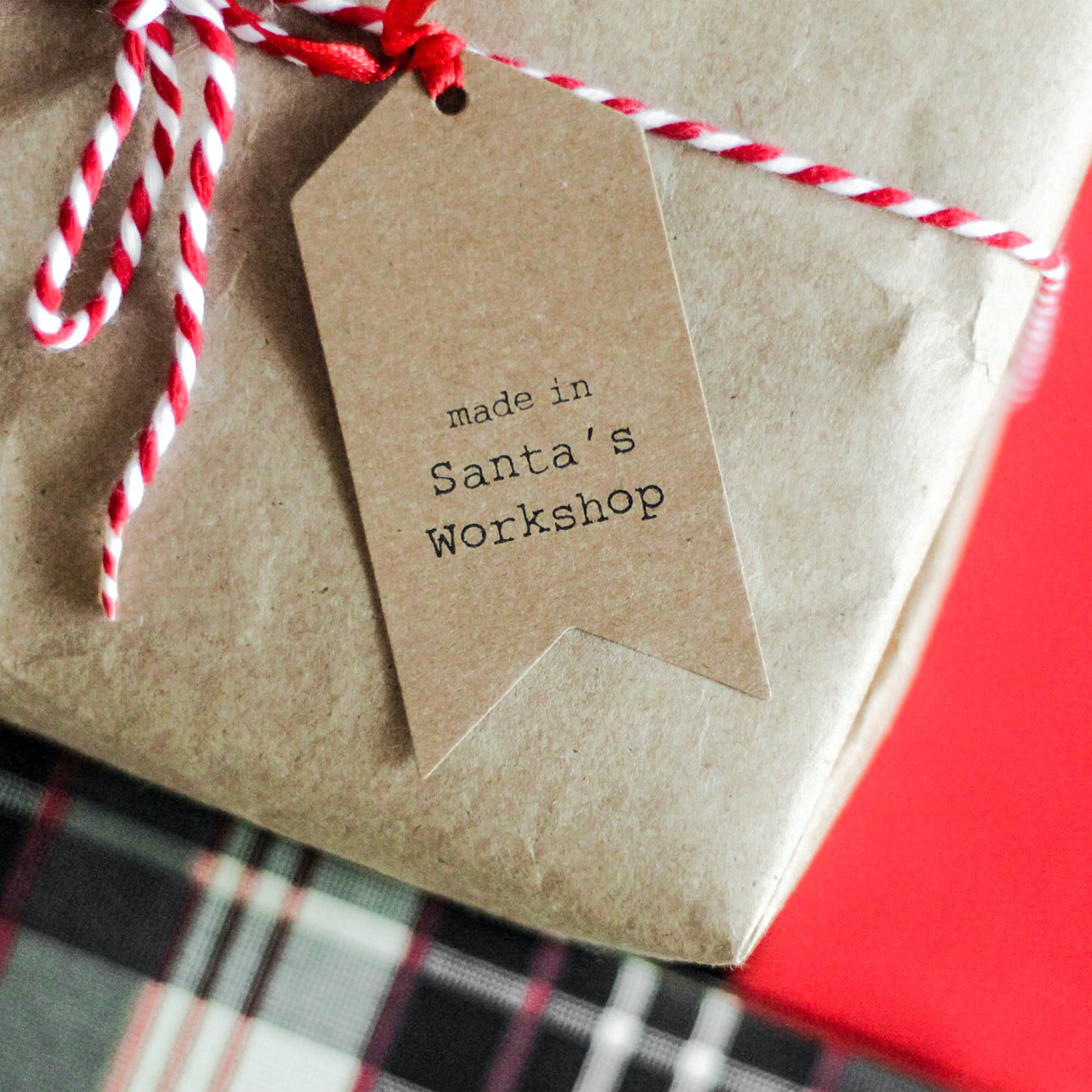 Parcel in brown wrapping with a label saying Made in Santa's Workshop