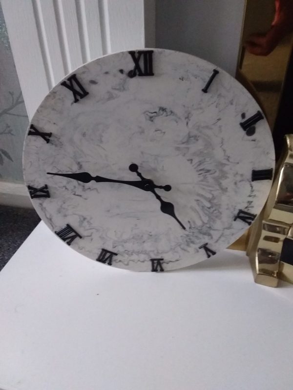 12" Round Clock. Black and White Marble Effect.