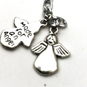 Tibetan silver bag /purse charm, black cord, angel