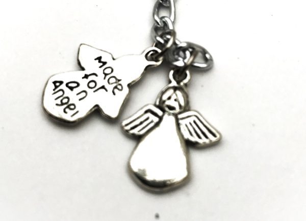 Tibetan silver bag /purse charm, black cord, angel