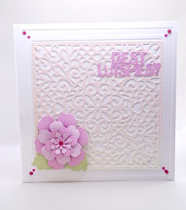 A very intricate filigree die cut any occasion card