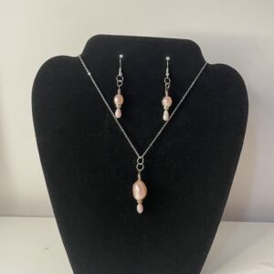 Pink blush neckless and earring set.