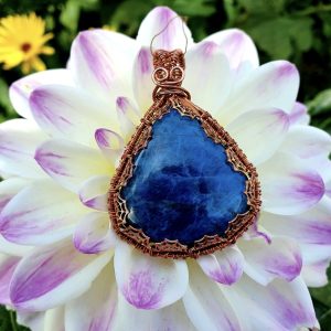 Apatite pendant in cobweb gallery wire